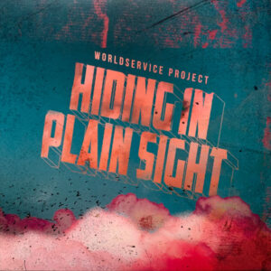 WORLDSERVICE PROJECT - Hiding In Plain Sight (Transparent Ruby Vinyl)