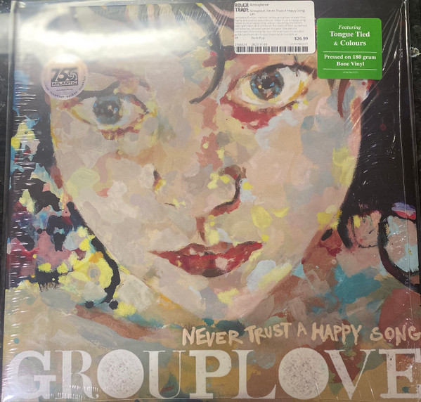 CATL6232711.jpg GROUPLOVE - NEVER TRUST A HAPPY SONG (CLEA - Image 1