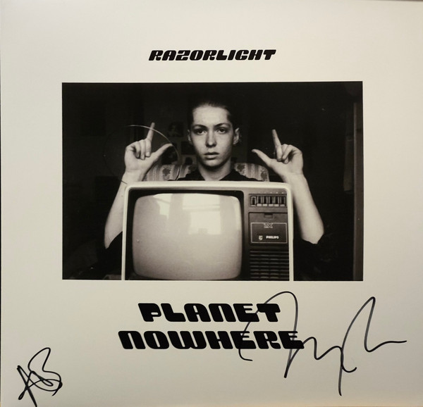 LPCOOK927IE.jpg RAZORLIGHT - Planet Nowhere (Smokey Vinyl) (Indie Exclusive) - Image 1